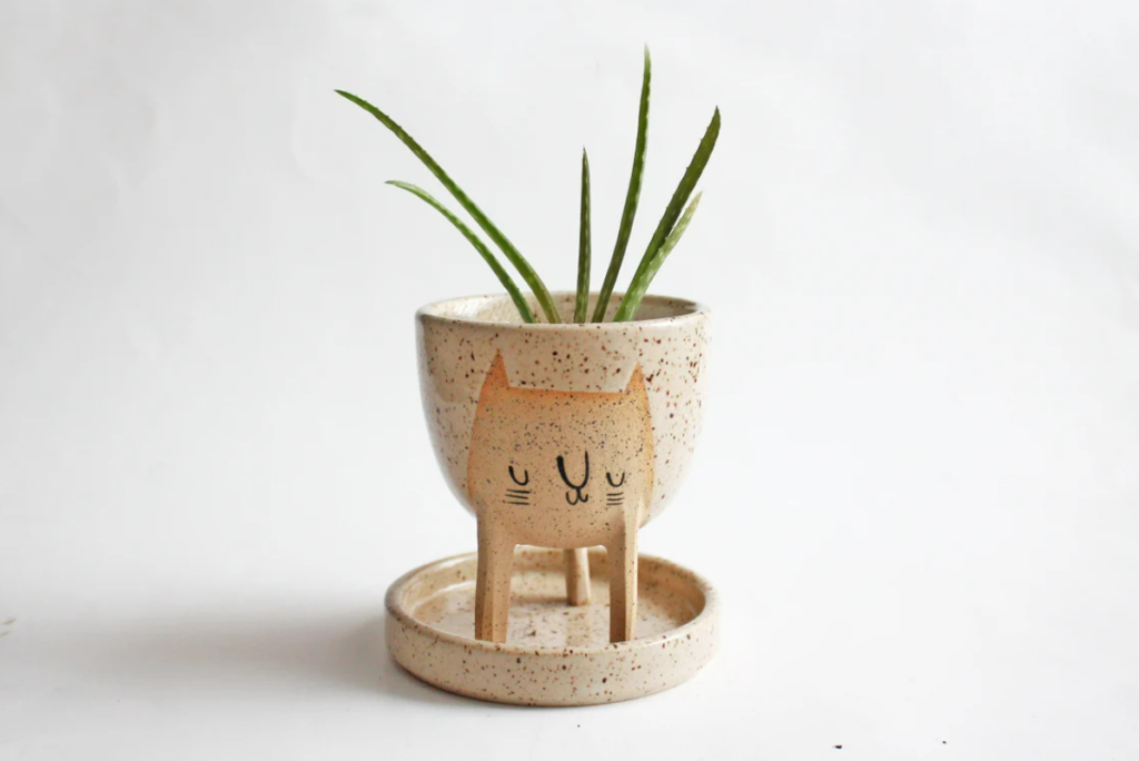 three-legged cat planter