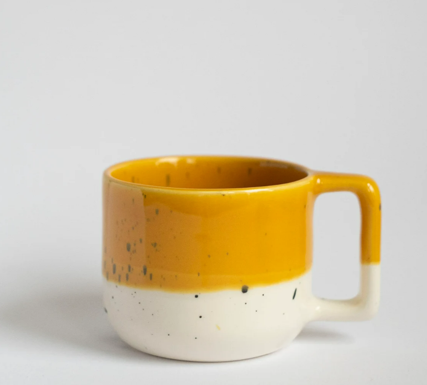 white and mustard mug