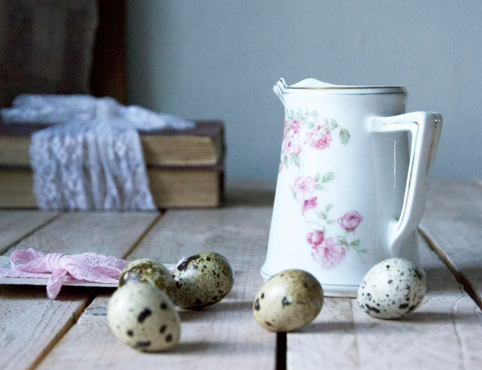 vintage milk jug with roses