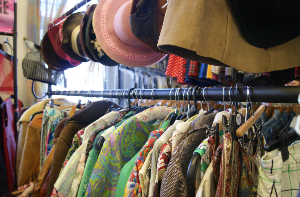 a rack of Vintage Clothes